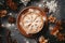 Snowflake latte with delicate foam art, top view, on dreamy winter blurred background