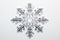 A snowflake is shown on a white background