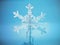 Snowflake standing on blue reflective surface. 3D illustration