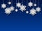 Snowflakes background. Papercut white snowflake shapes on blue backdrop, christmas winter holiday card. Xmas frozen