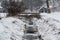 Snowflakes fallen on a snowy landscape and dig on a cold winter day in the district emsland germany