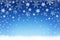 Snowflakes falling on snow. Background for Christmas and Winter