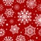 Snowflakes seamless pattern. Abstract christmas snow wallpaper, xmas decorative frost design. Red and white winter