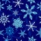 Snowflakes on Winter Blue Night Background Vector Seamless Pattern