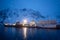 Snowing in Ballstad village at twilight in winter season, city the small harbour of Norwegian, Lofoten islands, Norway