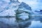 Snowing Floating Blue Iceberg Arch Reflection Paradise Bay Skintorp Cove Antarctica