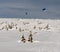 Snowkiters on Vysoka hole in winter Jeseniky mountains in Czech republic