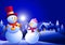 Snowman couple at winter night