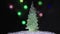 The snowman dances a round dance around a Christmas fir-tree against the background of colourful fires