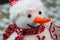 Snowman figurine isolated close up on details. Christmas composition with seasonal decorations and ornaments, christmassy mood