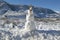 Snowman in fresh snowfall along Highway 33 north of Ojai, California