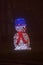 Snowman of lights. Front view, night