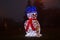 Snowman of lights. Front view, night