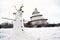 Snowman on a meadow in a Park in Magdeburg in Winter