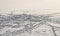 Snowman in the middle of an snowy frozen lake, close up