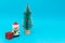 Snowman, presents and Christmas tree with copy space.new year celebration