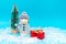 Snowman with protective mask presents and Christmas tree snow with copy space.new year celebration