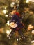 Snowman skier Christmas ornament on tree with focus on face