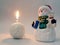 Snowman and snowball candle