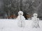 Snowman standing in winter landscape