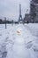 Snowman under the Eiffel tower