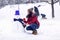 Snowman.Wintertime. Happy holiday. girl playing with snow on winter day