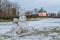 Snowmen stand on the lawn in front of the Pheasant Castle.