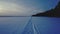 Snowmobile road on the frozen lake