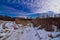 Snowmobile trail through the fields and cattails of the oak savanna at Donald County park