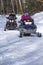 Snowmobilers ride on a trail on Bald Mountain, Rangeley, Maine.