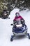 Snowmobilers ride on a trail on Bald Mountain, Rangeley, Maine.