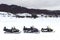 Snowmobiles parked in a ski resort close-up