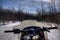 Snowmobiling through the Woods of Northern Minnesota in Winter