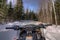 Snowmobiling through the Woods of Northern Minnesota in Winter