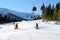 The snowpark, skiers and cableway in Jasna Low Tatras