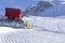 Snowplow clears tracks in the ski resort of the Hintertuxer in Tyrol, Austria