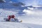 Snowplow clears tracks in the ski resort of the Hintertuxer in Tyrol, Austria