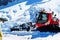 A snowplow with driver cleaning the walking road on mountain at Jungfraujoch, Switzerland on 13 October, 2023