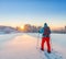 Snowshoe walker running in powder snow