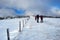 Snowshoers in winter Fischbacher Alpen mountains near Stuhleck resort in Styria