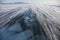 Snowstorm on ice of Lake Baikal. Winter landscape