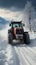 After the snowstorm, a tractor diligently clears the road, creating a passage.