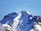 Snowy alpine mountain peak Wildhorn located in the Bernese Alps massif seen from the Sex Rouge Glacier, Les Diablerets - Suisse