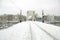 Snowy Amsterdam with the Thiny bridge in the Netherlands