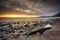 Snowy beach in Gdynia Orlowo at sunrise, Baltic Sea. Poland