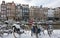 Snowy bikes in Amsterdam in winter in the Netherlands