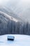 Snowy cabin in the mountains