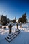 Snowy churchyard on a bright winter afternoon