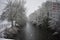 Snowy day in Leamington Spa UK, view over the Leam River, Pump Room Gardens - 10 december 2017