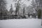 Snowy day in Leamington Spa UK, view of the small bridge over Leam River, Pump Room Gardens - 10 december 2017